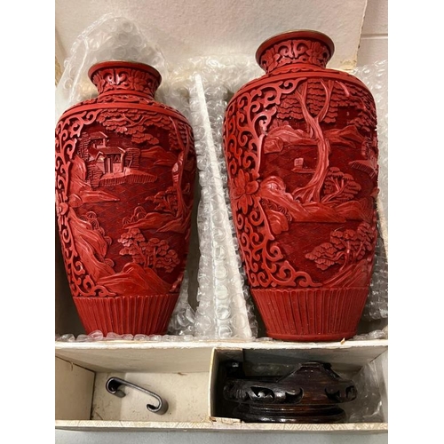 322 - A pair of Chinese cinnabar vases and a cloisonne pot