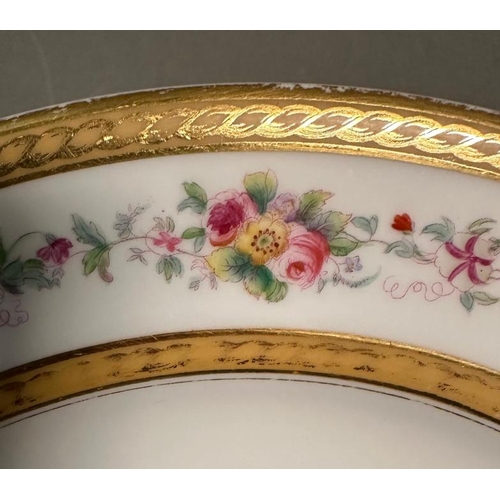 323 - A selection of Royal Worcester dinner plates with gilt and floral rims