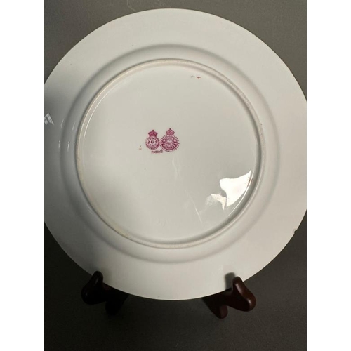 323 - A selection of Royal Worcester dinner plates with gilt and floral rims