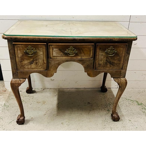 33 - A Georgian side table/lowboy with ball claw feet (H74cm W88cm D49cm)