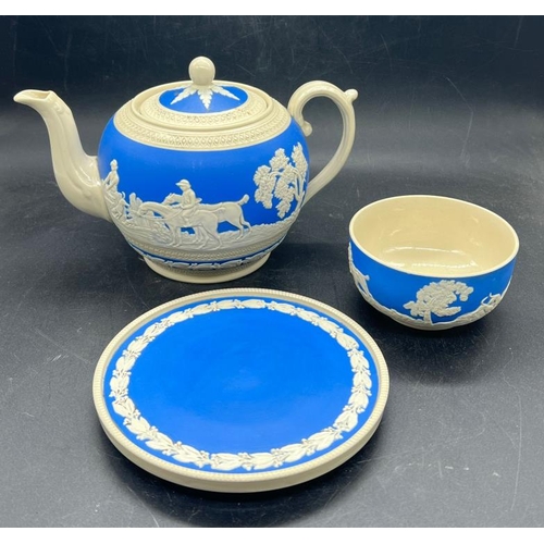 338 - A Copeland Spode jasperware teapot with stand and sugar bowl, all with a relief hunting scene