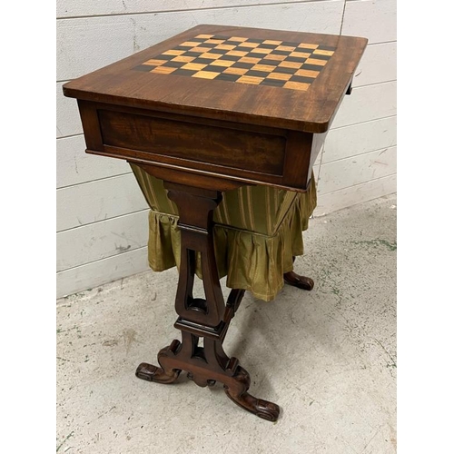 34 - A Victorian games table (H69cm W52cm D39cm)