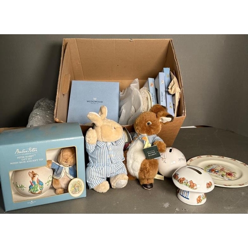 341 - A quantity of Beatrix Potter collectables to include money boxes, Wedgewood plates and cuddly toys