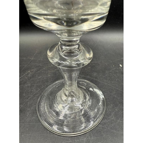 342 - An 18th Century Baluster wine glass, approximate height 148mm.