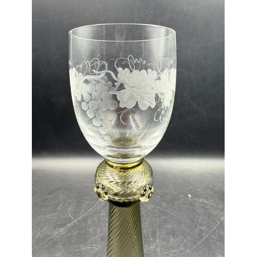 343 - A pair of Theresienthal wine glasses with etched grape vine design along with original stickers to b... 