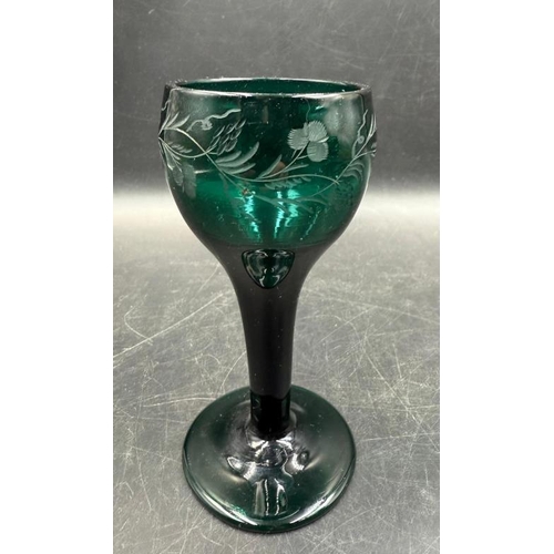 346 - Set of four Georgian, engraved green glasses, approximate height 11cm.