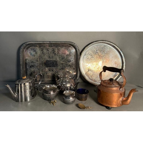 369 - A quantity of mixed metal items to include silver plate tea pots and trays and an early electric cop... 