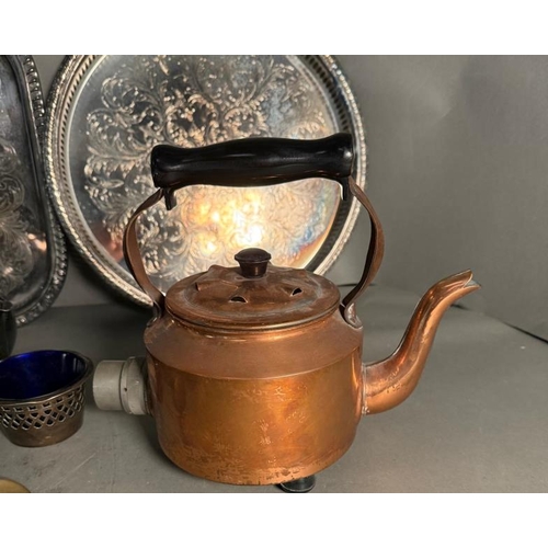 369 - A quantity of mixed metal items to include silver plate tea pots and trays and an early electric cop... 