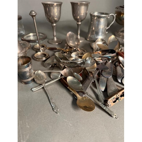 390 - A large selection of silverplated items, EPNS and pewter including rose bowls, flatware etc.