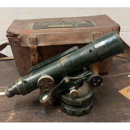 394 - A vintage theodolite by Troughton and Simms of London boxed and with tripod stand