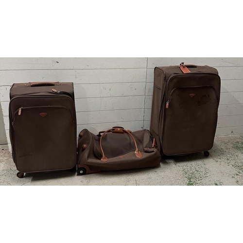 399 - A selection of brown leather luggage by Jump of Paris