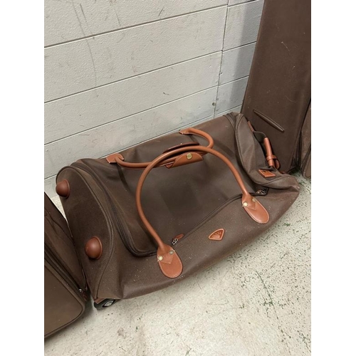 399 - A selection of brown leather luggage by Jump of Paris