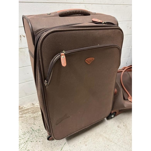 399 - A selection of brown leather luggage by Jump of Paris