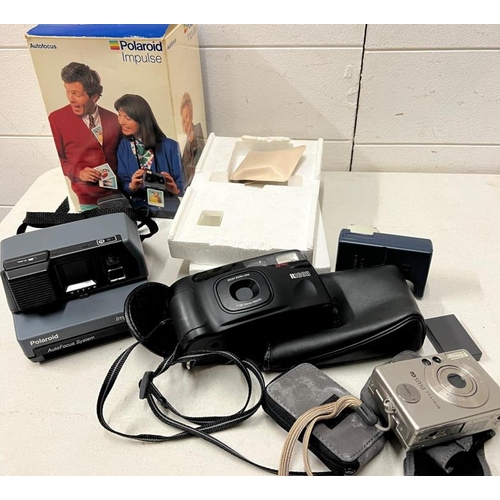 401 - A Polaroid Impulse camera along with two compac cameras