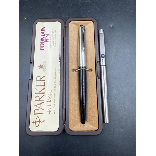 412 - Two Parker pens, a 45 classic fountain pen and a roller ball