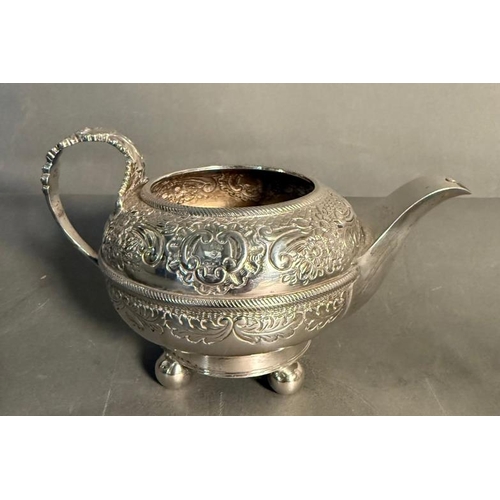 458 - A George III silver tea set, to include milk jug and sugar bowl along with teapot with swan finial, ... 