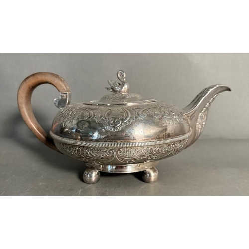 458 - A George III silver tea set, to include milk jug and sugar bowl along with teapot with swan finial, ... 