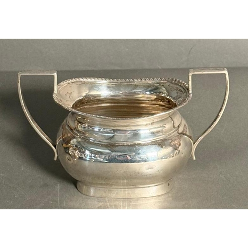 459 - A hallmarked three piece silver tea service by G W Shirtcliffe & Son to include teapot, sugar bowl a... 