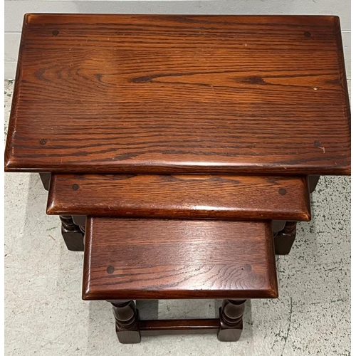 46 - An oak nest of tables (H66cm W60cm D33cm)