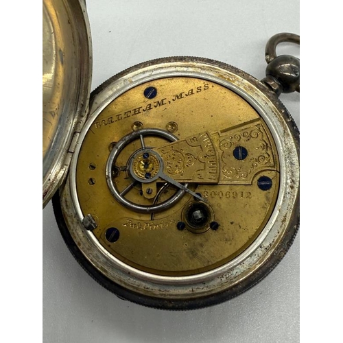 475 - An AF silver pocket watch (A.W.Co Waltham) along with a silver pencil marked 900.