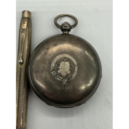 475 - An AF silver pocket watch (A.W.Co Waltham) along with a silver pencil marked 900.