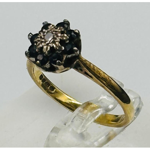 515 - An 18ct gold sapphire and diamond ring, approximate weight 3.6g and size L.5