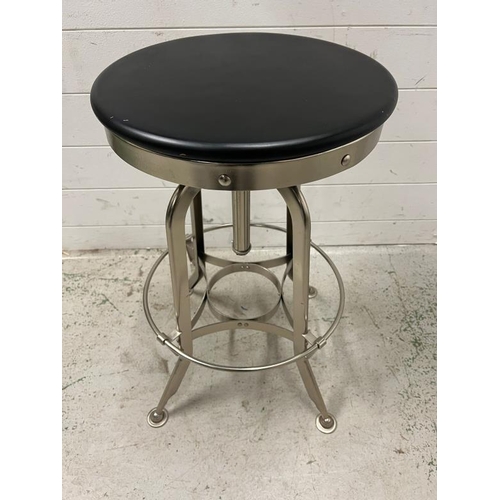 55 - An industrial style adjustable bar stool