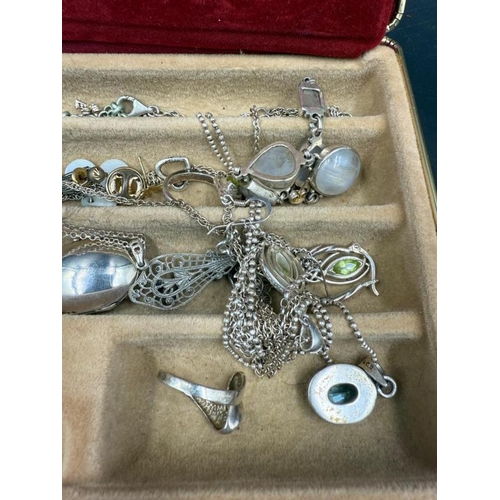 569 - A selection of silver jewellery to include, necklaces, rings, some amber etc.