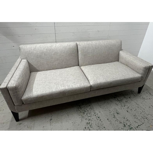 58 - Kingcome sofa, sharp outline with a linen style upholstery (H84cm W215cm D90cm)