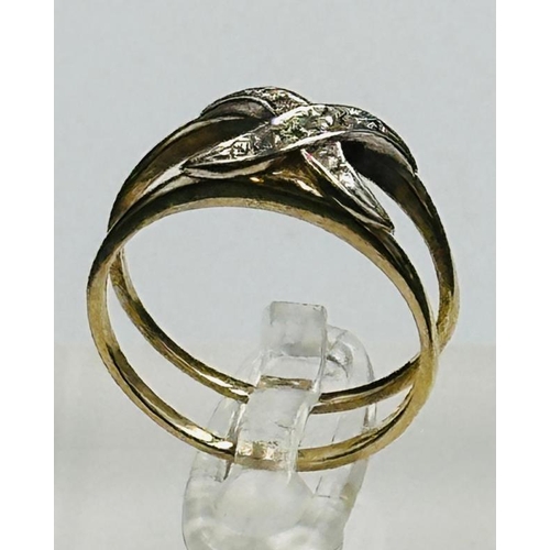 583 - A double crossover diamond ring, approximate weight 2.3g and size P