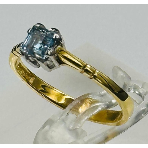 600 - An 18ct yellow gold set aquamarine ring, approximate size L.5 and weight 2.2g.