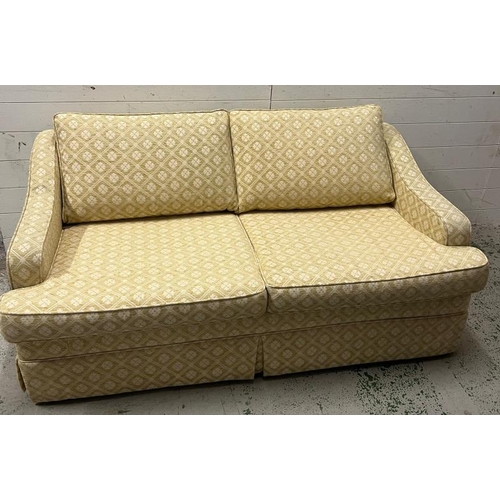 62 - A small two seater sofa bed (H64cm W160cm D80cm)