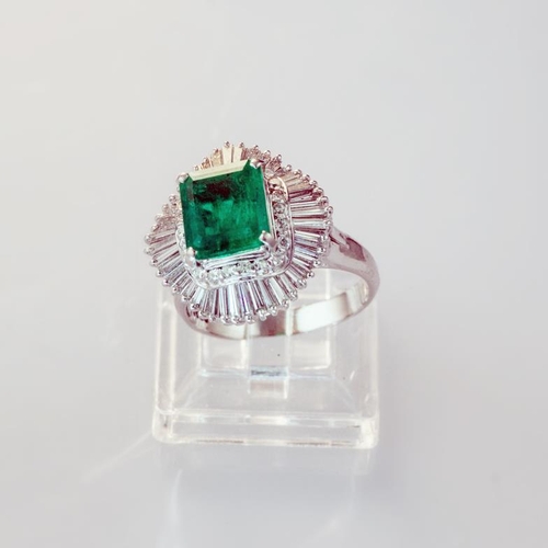 622 - An emerald and diamond ballerina style cluster ring, emerald cut emerald, approximately 2.25 carat, ... 