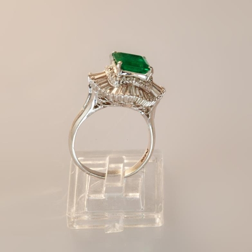 622 - An emerald and diamond ballerina style cluster ring, emerald cut emerald, approximately 2.25 carat, ... 