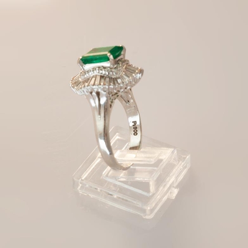 622 - An emerald and diamond ballerina style cluster ring, emerald cut emerald, approximately 2.25 carat, ... 