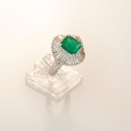 622 - An emerald and diamond ballerina style cluster ring, emerald cut emerald, approximately 2.25 carat, ... 