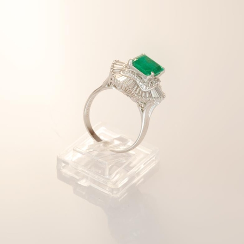 622 - An emerald and diamond ballerina style cluster ring, emerald cut emerald, approximately 2.25 carat, ... 