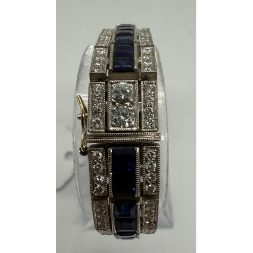 626 - A Modern Diamond and sapphire cocktail bracelet, length 175.00mm x 9,80mm, gross weight 43.90g Diamo... 