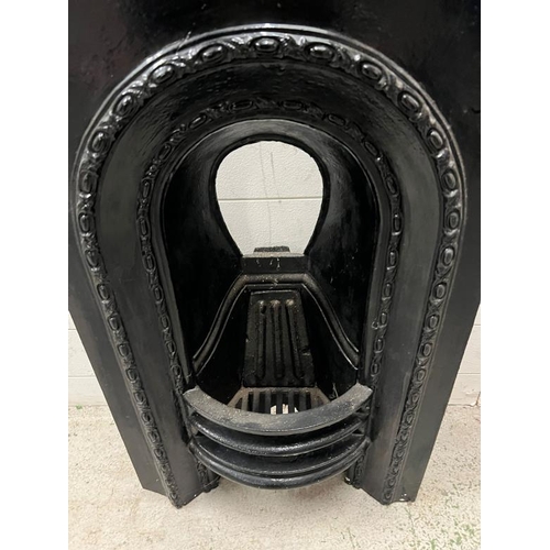 63 - A reclaimed cast iron fire place (H92cm W46cm D20cm)