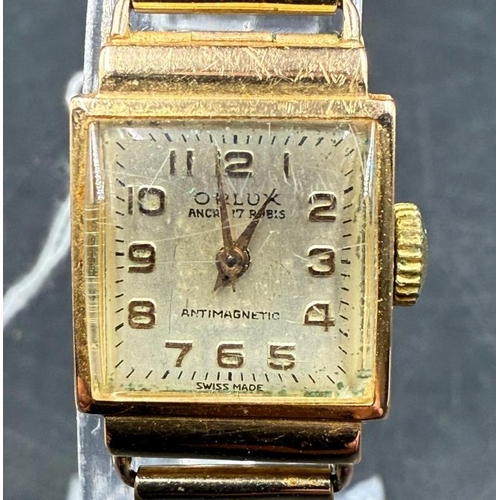 661 - An 18ct gold Orlux ladies watch on expandable metal bracelet