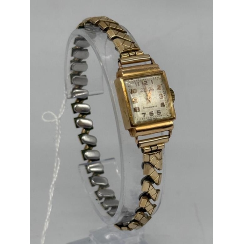 661 - An 18ct gold Orlux ladies watch on expandable metal bracelet