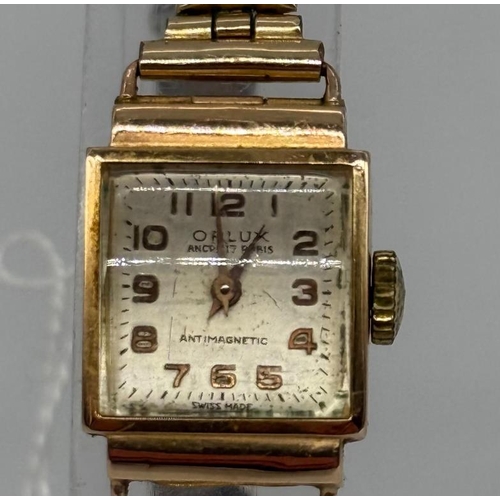 661 - An 18ct gold Orlux ladies watch on expandable metal bracelet