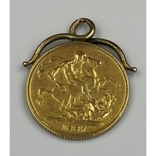 673 - An 1887 gold sovereign coin on 9ct mount, approximate total weight 8.4g