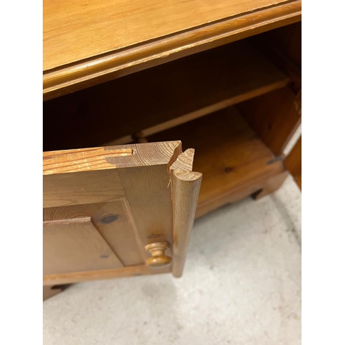 69 - A side cabinet opening to shelves (H57cm W70cm D50cm) AF