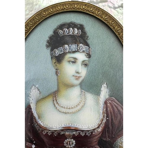 710 - A miniature of Pauline Boneparte with mother of pearl and metal frame. 12cm x 10cm