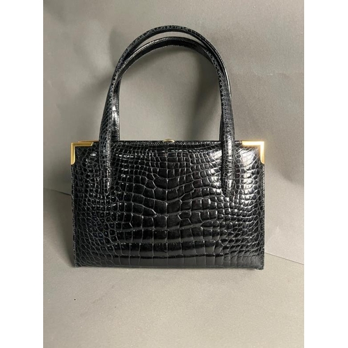 730 - 1950's Gucci black crocodile hand bag with leather inferior