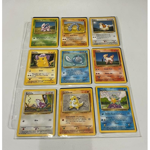 743 - A partial Pokemon Basic set 71/102 including 4 Holo cards