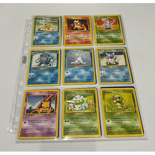 743 - A partial Pokemon Basic set 71/102 including 4 Holo cards