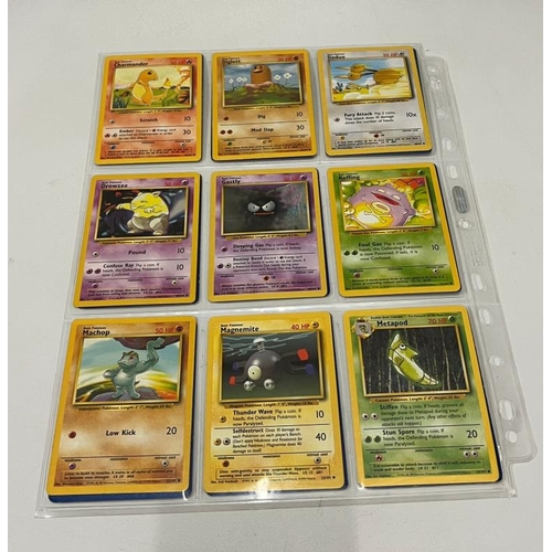 743 - A partial Pokemon Basic set 71/102 including 4 Holo cards