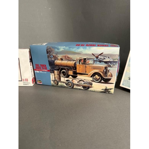 759 - Four model kits, A Northop Gamma, Isuzu fuel truck, Ford Model T and a BMW 3/15 ps